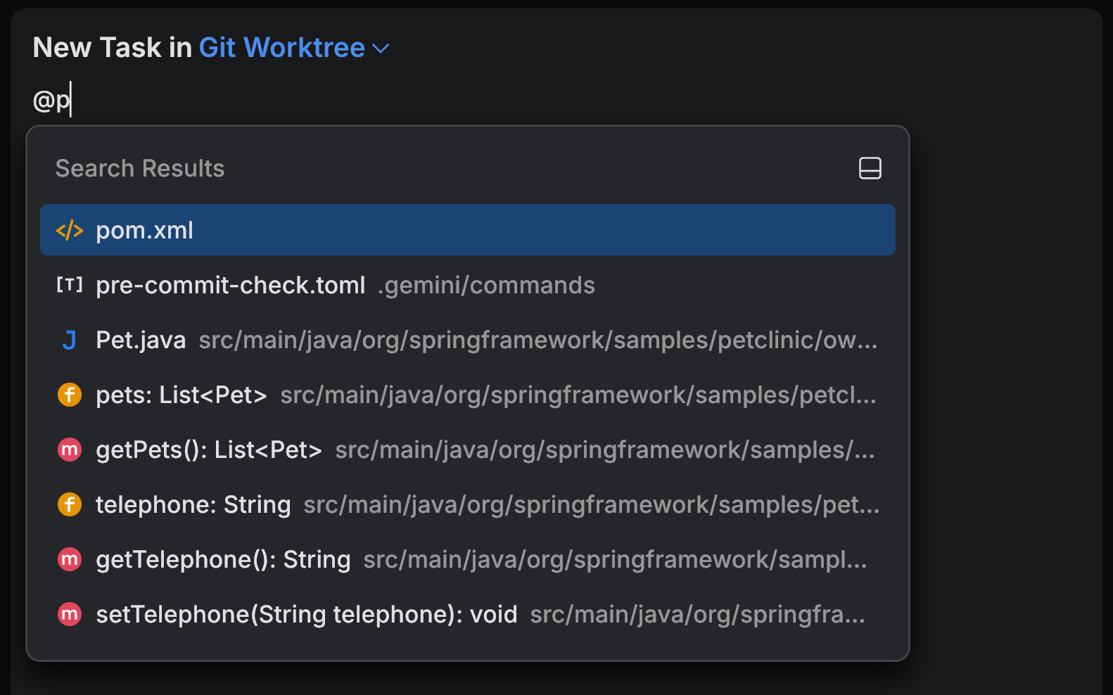 Typing after @ to search through files, folders, and symbols