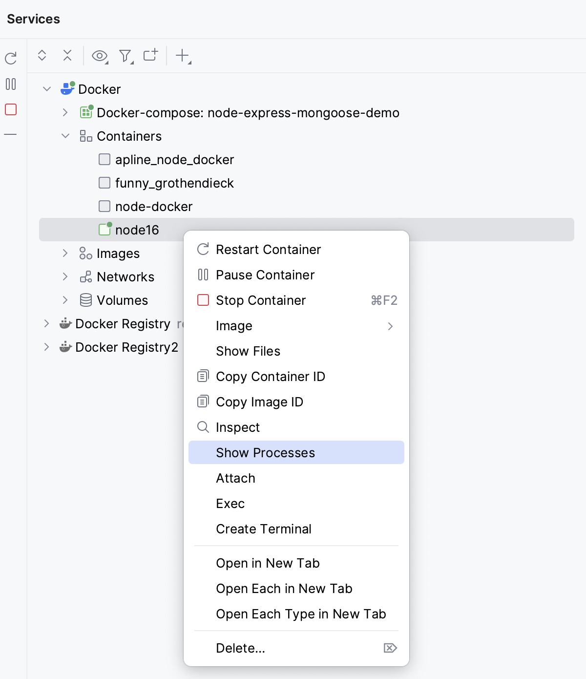 Show processes in a running container