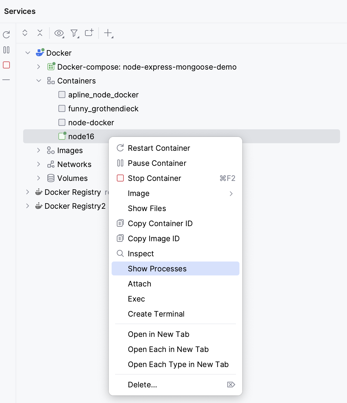 Show processes in a running container Show processes in a running container