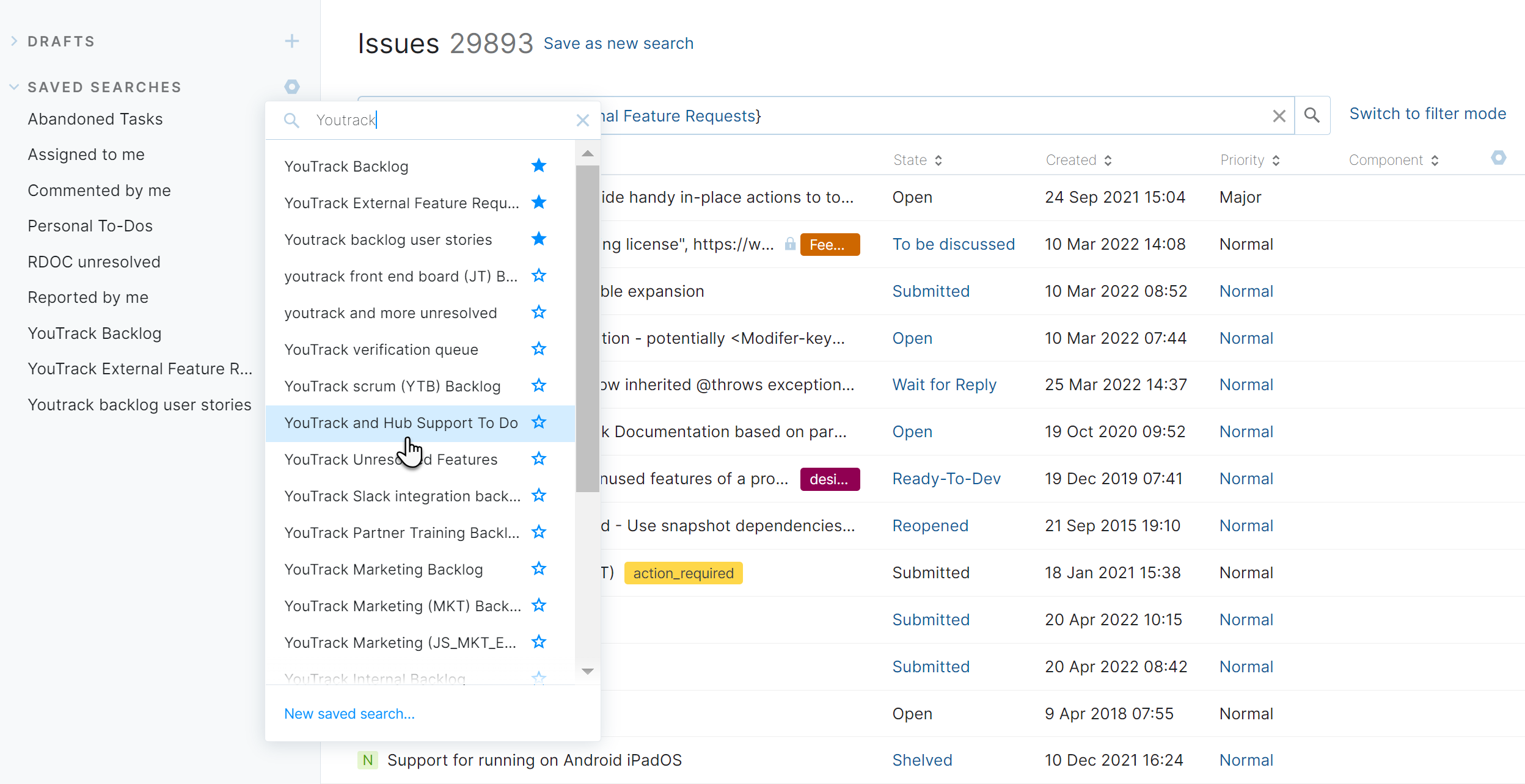 Selecting a saved search from the sidebar in the Issues list.